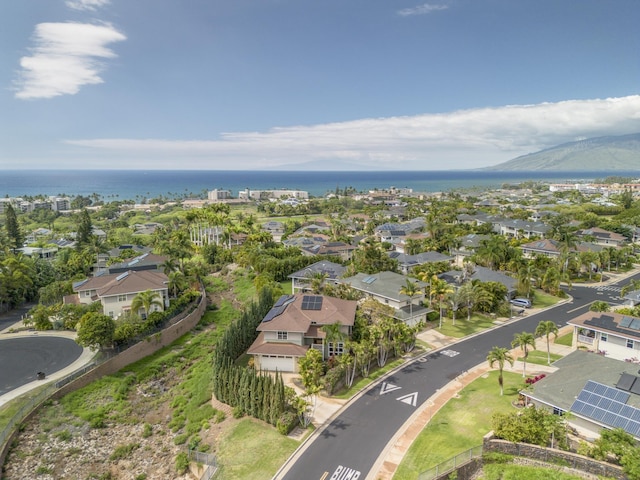 birds eye view of property featuring a water view and a residential view