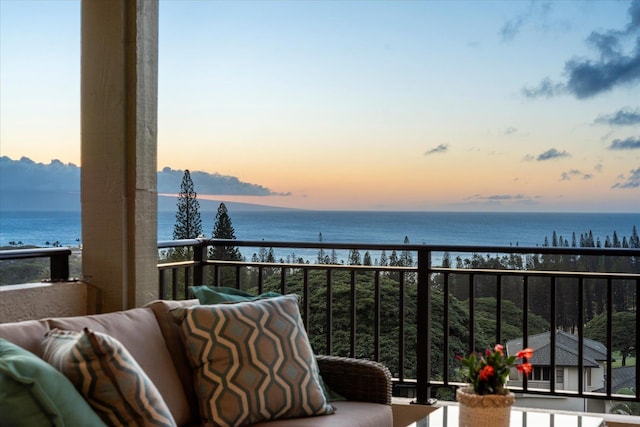 balcony at dusk with a water view