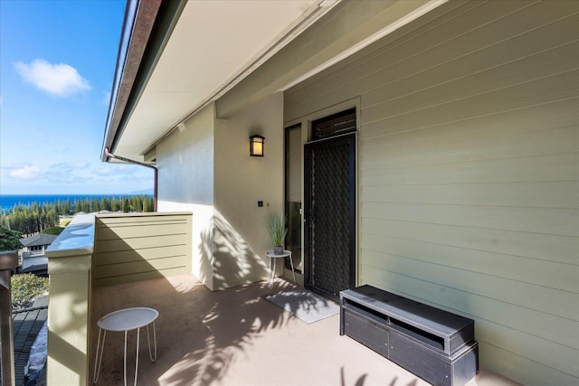 view of patio / terrace with a balcony