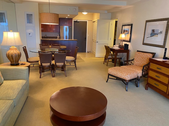 view of carpeted dining space