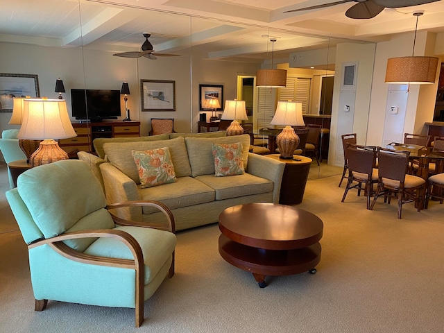 carpeted living room with beam ceiling and ceiling fan