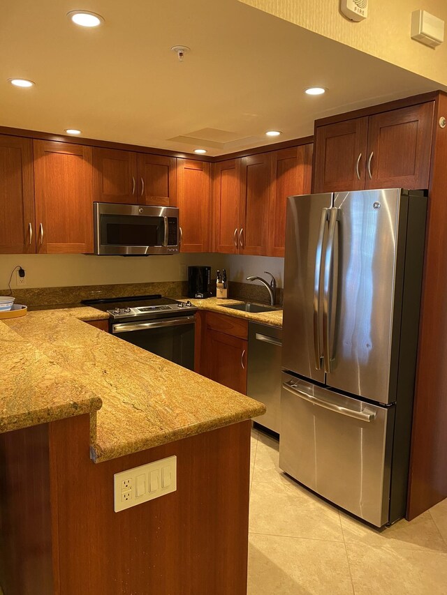 2481 Kaanapali Pkwy Unit 620V, Lahaina, HI 96761 - kitchen with stainless steel appliances, a sink, light stone countertops, recessed lighting, and light tile patterned floors