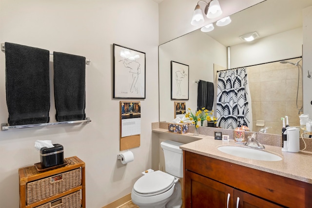 bathroom with vanity, toilet, and a shower with curtain