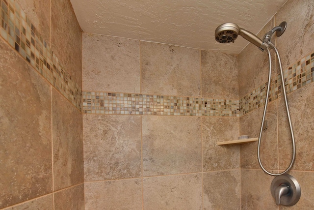 details with a tile shower