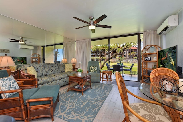 living room featuring ceiling fan, wood-type flooring, floor to ceiling windows, and a wall mounted air conditioner