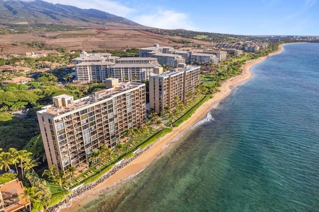 bird's eye view with a water and mountain view and a beach view