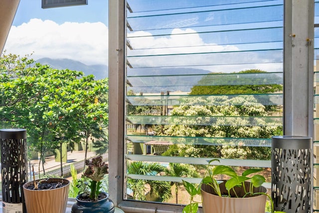 balcony featuring a mountain view