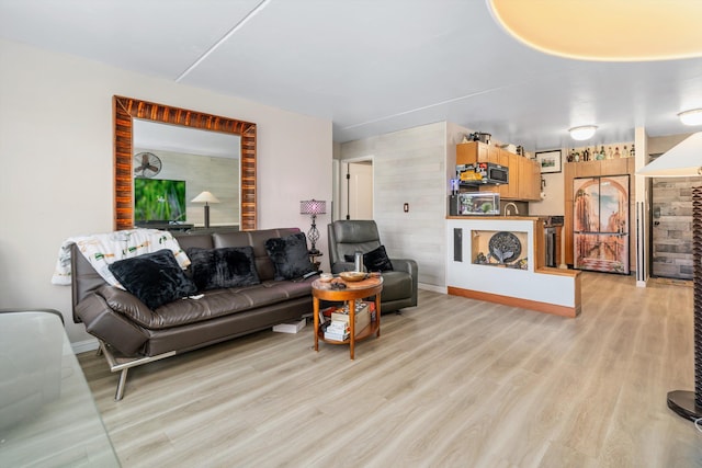 living room with light wood-style floors