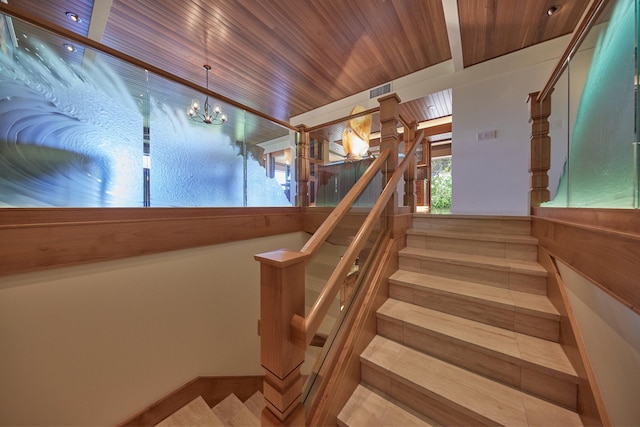 4000 Wailea Alanui Dr Unit 901, Kihei, HI 96753 - stairs with a chandelier, wood ceiling, and tile patterned floors