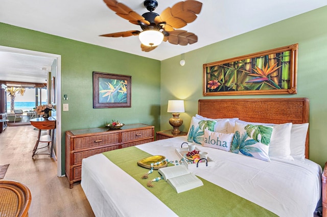 bedroom featuring light hardwood / wood-style flooring and ceiling fan