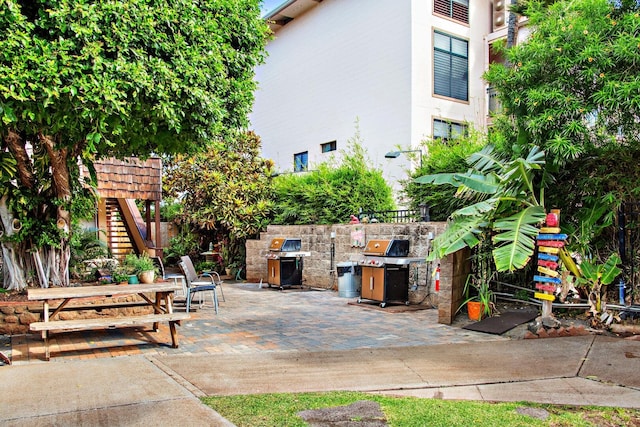 view of patio featuring a grill