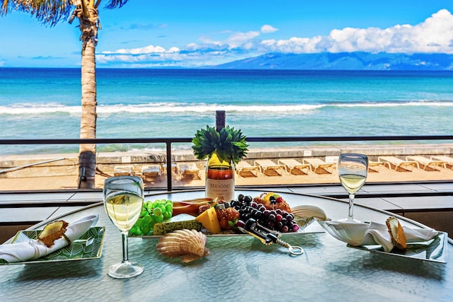 balcony with a water and mountain view