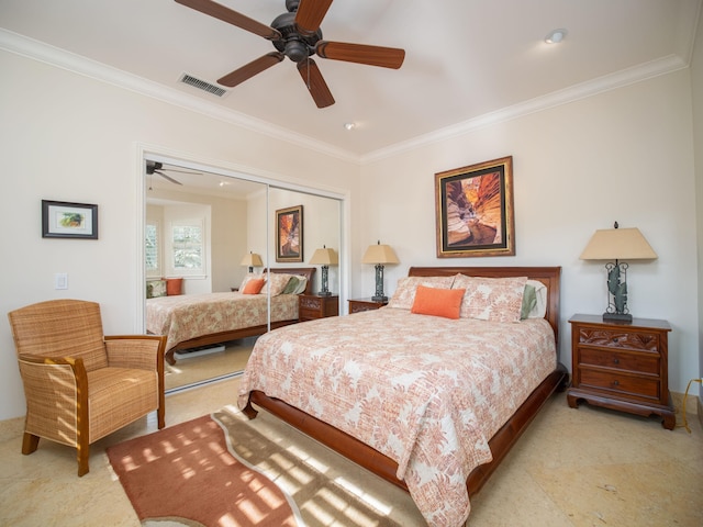 bedroom with ceiling fan, a closet, and ornamental molding