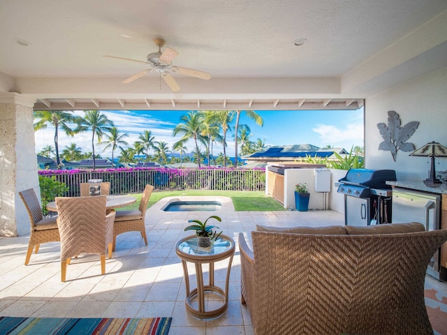 view of patio featuring ceiling fan and area for grilling