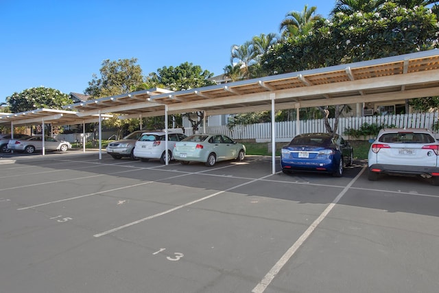 view of parking with a carport