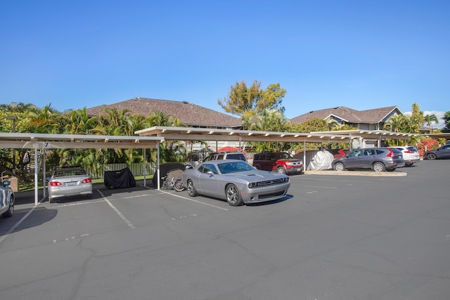 view of parking / parking lot with a carport