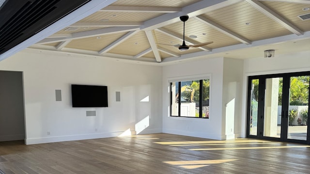 unfurnished living room with hardwood / wood-style flooring, beam ceiling, high vaulted ceiling, wooden ceiling, and french doors