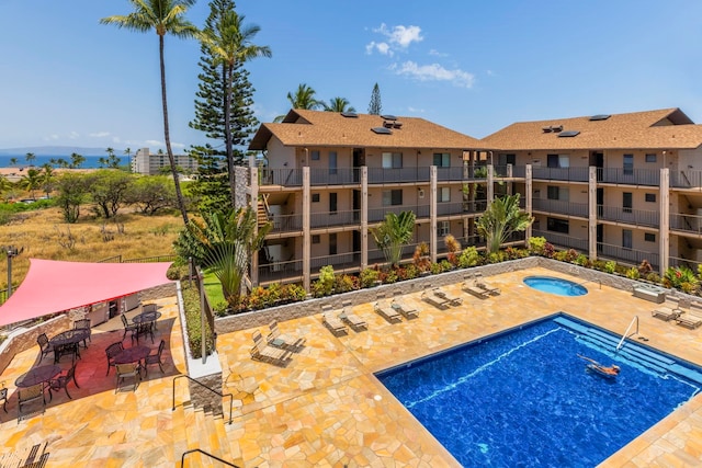 view of swimming pool featuring a patio