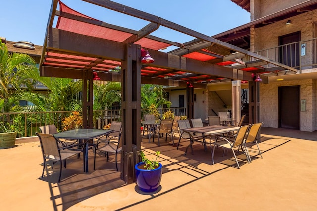 view of patio featuring a pergola