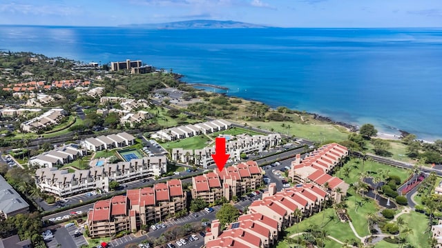 drone / aerial view with a water view