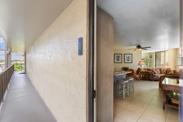 938 S Kihei Rd Unit 403, Kihei, HI 96753 - balcony featuring an outdoor living space and a ceiling fan