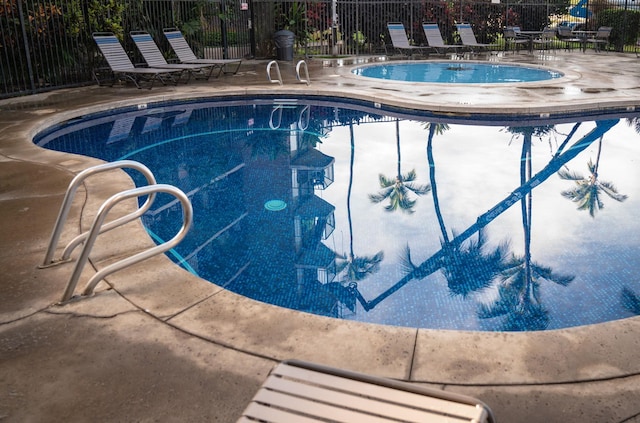 view of pool featuring a patio area