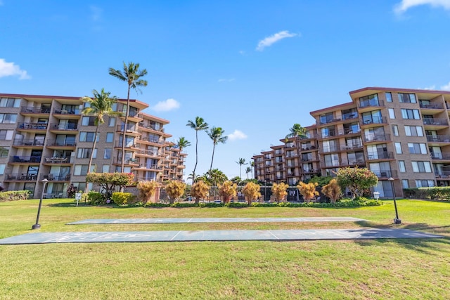 938 S Kihei Rd Unit 403, Kihei, HI 96753 - view of property's community featuring a yard