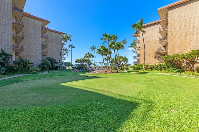 938 S Kihei Rd Unit 403, Kihei, HI 96753 - view of community featuring a lawn