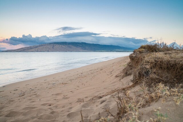 938 S Kihei Rd Unit 403, Kihei, HI 96753 - water view featuring nearby beach and a mountain backdrop