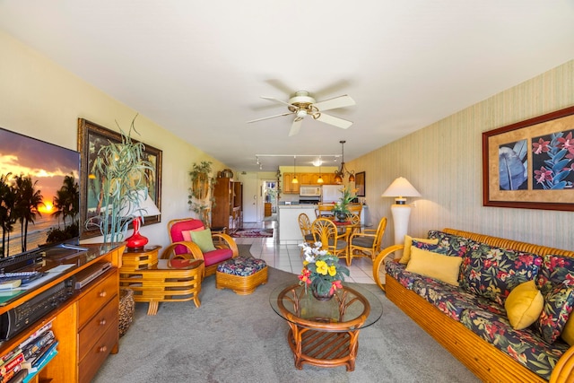 tiled living room featuring ceiling fan