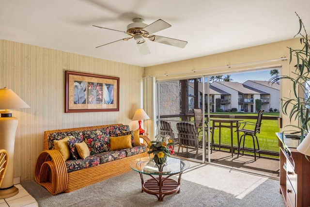 tiled living room featuring ceiling fan