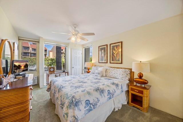 carpeted bedroom with access to outside and ceiling fan