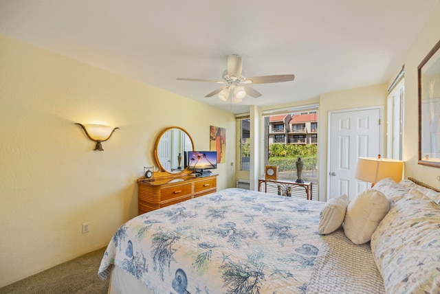 bedroom with access to exterior, carpet, and ceiling fan