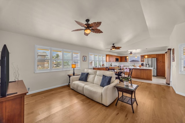 1363 Owaka St, Wailuku, HI 96793 - living room featuring a ceiling fan and light wood-style flooring