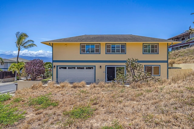 1363 Owaka St, Wailuku, HI 96793 - view of front of house with a garage