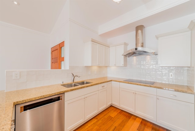 kitchen featuring black electric stovetop, ventilation hood, sink, dishwasher, and light hardwood / wood-style floors