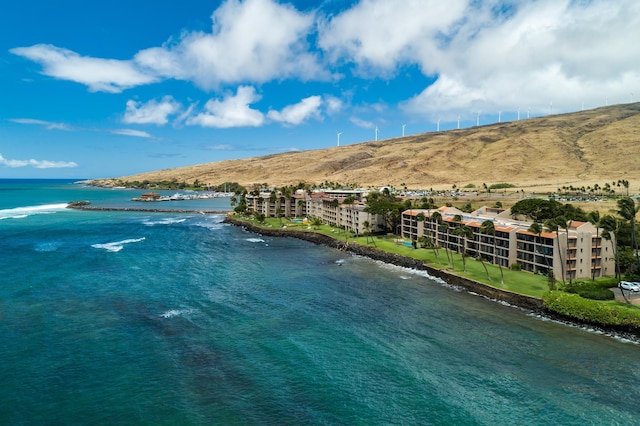 birds eye view of property featuring a water view