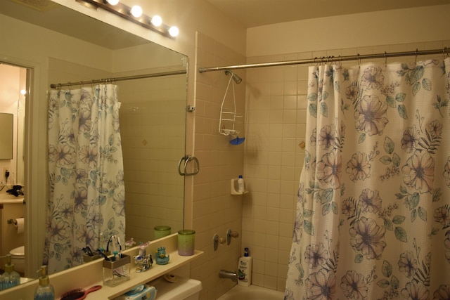 140 Uwapo Rd Unit 41-203, Kihei, HI 96753 - full bathroom featuring shower / bath combination with curtain and vanity