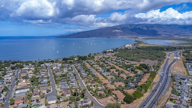 140 Uwapo Rd Unit 41-203, Kihei, HI 96753 - aerial overview of property's location with a water and mountain view and nearby suburban area