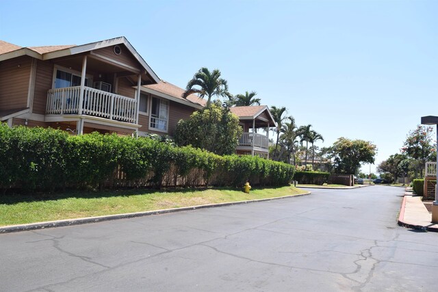 140 Uwapo Rd Unit 41-203, Kihei, HI 96753 - view of asphalt road with curbs