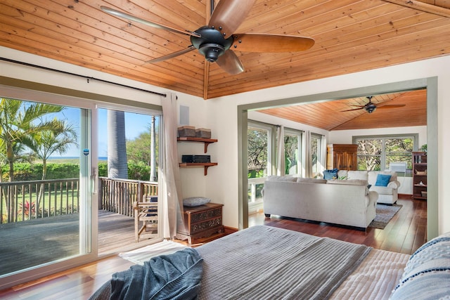 bedroom with lofted ceiling, access to outside, multiple windows, and wood ceiling