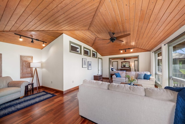 living room featuring lofted ceiling, dark wood-type flooring, wood ceiling, track lighting, and baseboards