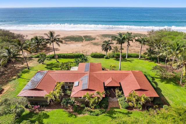 bird's eye view featuring a water view and a view of the beach