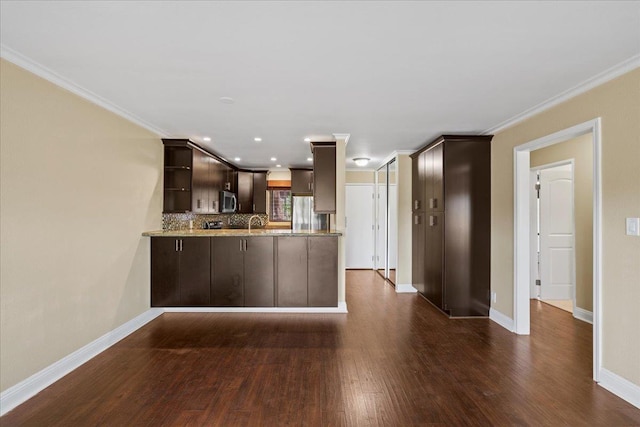 15 Kulanihakoi St Unit 11B, Kihei, HI 96753 - kitchen featuring dark brown cabinetry, dark wood-type flooring, appliances with stainless steel finishes, open shelves, and crown molding