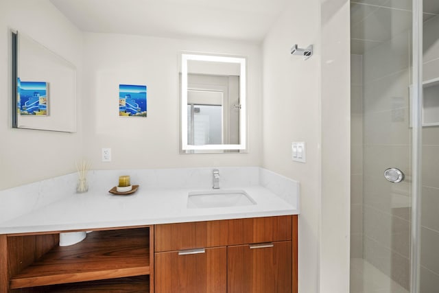 bathroom with vanity and walk in shower