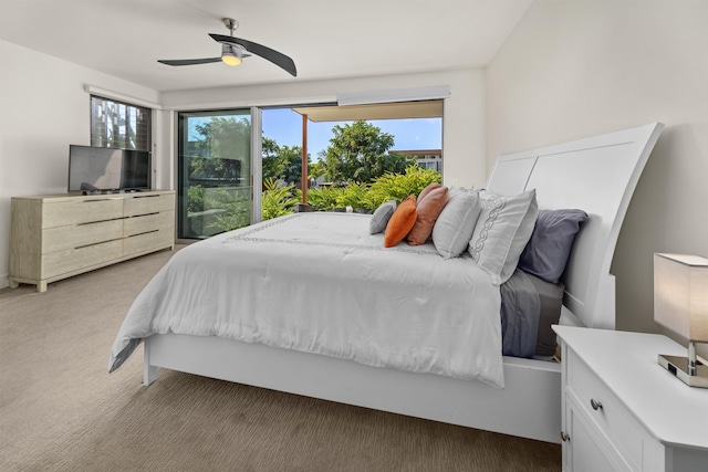 bedroom featuring ceiling fan and light colored carpet