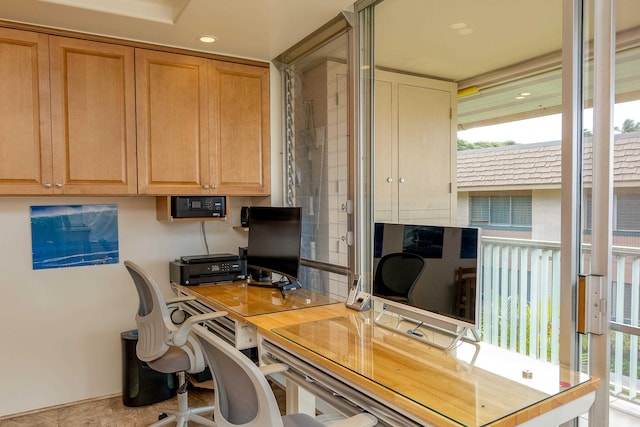 home office featuring light tile patterned floors