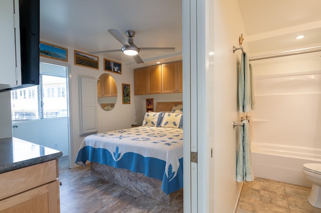 bedroom featuring ceiling fan and a closet