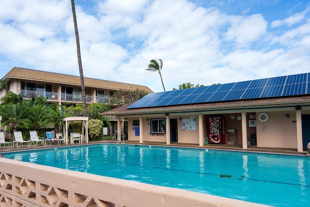 view of swimming pool with a patio