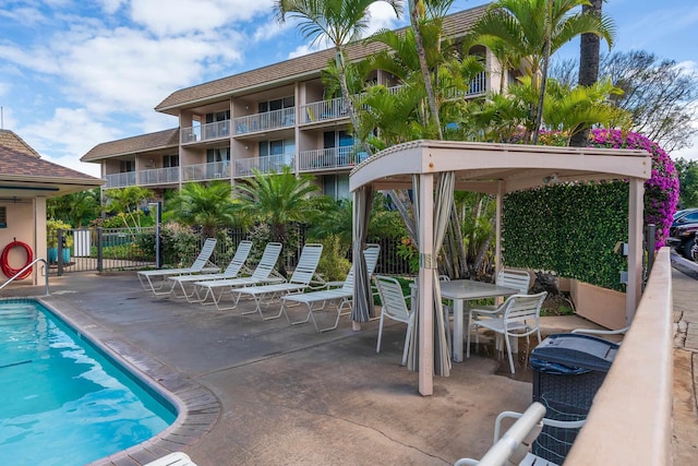 view of swimming pool featuring a patio